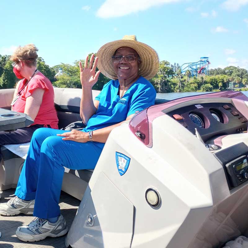 AFI staff and client on a boat