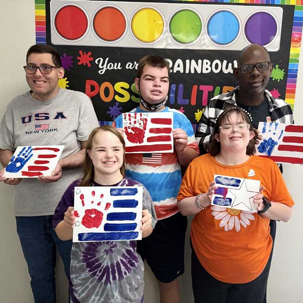 AFI clients showing their artwork