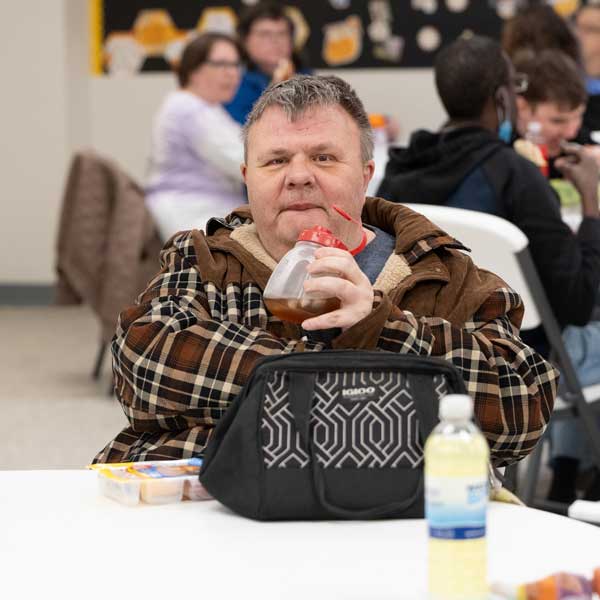 AFI client eating lunch