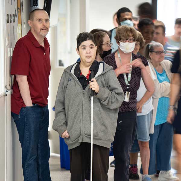 AFI clients waiting in line