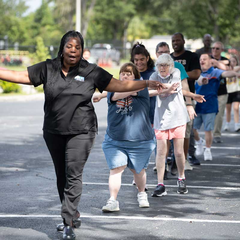AFI instructor and clients doing exercise